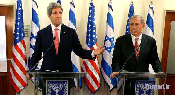 Kerry speaks as Israeli Prime Minister Benjamin Netanyahu (right) listens during a news conference following a meeting at Netanyahu's office in Jerusalem on Dec. 5. | Reuters