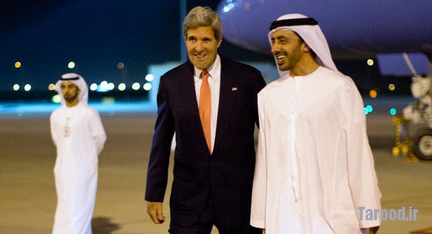 Kerry (center) walks with United Arab Emirates Foreign Minister Abdullah bin Zayed Al Nahyan upon Kerry's arrival in Abu Dhabi on Nov. 10. | Reuters
