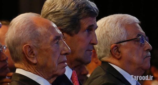 Kerry (center) is joined by Israeli President Shimon Peres (left) and Palestinian President Mahmoud Abbas at the World Economic Forum on the Middle East and North Africa at the King Hussein Convention Centre at the Dead Sea on May 26. | Reuters