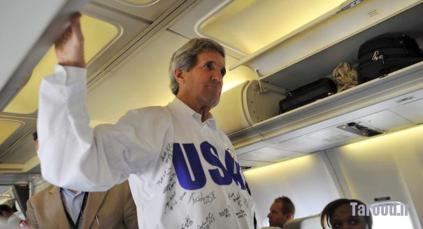 Kerry talks to journalists on board his plane after his departure from Moscow on May 8. | Reuters