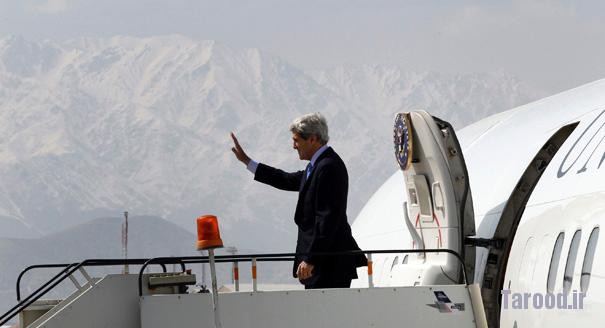 Kerry waves from the steps of his aircraft with the snow-capped mountains of Afghanistan in the background as he departs Kabul, Afghanistan, on March 26. | Reuters
