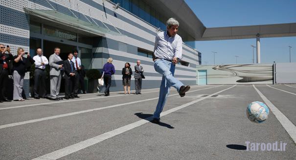 Kerry participates in an impromptu game of soccer with staff as he waits for his plane to refuel between Islamabad and London at Vienna Airport on Aug. 2. | Reuters