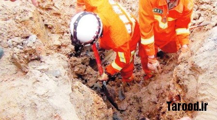 A woman buried by tons of sand on a construction site in China was saved because her hard hat created an air pocket that allowed her to breathe.The accident happened in the county of Jinjiang in southeast China?s Fujian province when Mingmei Xiong, 34, fell into the sandpit nearly 80 feet deep on the construction site, and had a wall of sand fall on top of her.But thanks to the fact that she had a hard hat on, she was able to survive as it created a pocket of air that allowed her to breathe in the crucial 30 minutes it took for colleagues and firemen to reach her.Rescuer Shaiming Liang, 43, said: "We reached her head but the big problem was that the soft, shifting sand would cover her as fast as we could dig it out."It was like the sand did not want to let her go."When the firemen turned up Xiong had already been trapped in the pit for 30 minutes.One fireman was fastened by a rope to go into the pit upside down to remove the sand around Xiong?s head while others with shovels kept moving away the sand around the pit.Fire brigade spokesman Chung Pan, 45, said: "It had to be done with extreme care. The sand was fine and wanted to move in one direction only - down on to the head of the trapped victim. It was very tense, a real race against time before there was another major collapse."While the digger and the fireman on the rope kept her nose and mouth free, other firemen dug a rescue tunnel ten feet long beside the woman to allow her to be pulled free."She popped out like a cork from a bottle," said Meng Huang, 31, a co-worker. "We were so happy. We thought she was a goner."Xiong was conscious if somewhat shell-shocked after her release, and was taken to hospital where she spent a night under observation before being allowed to go home.